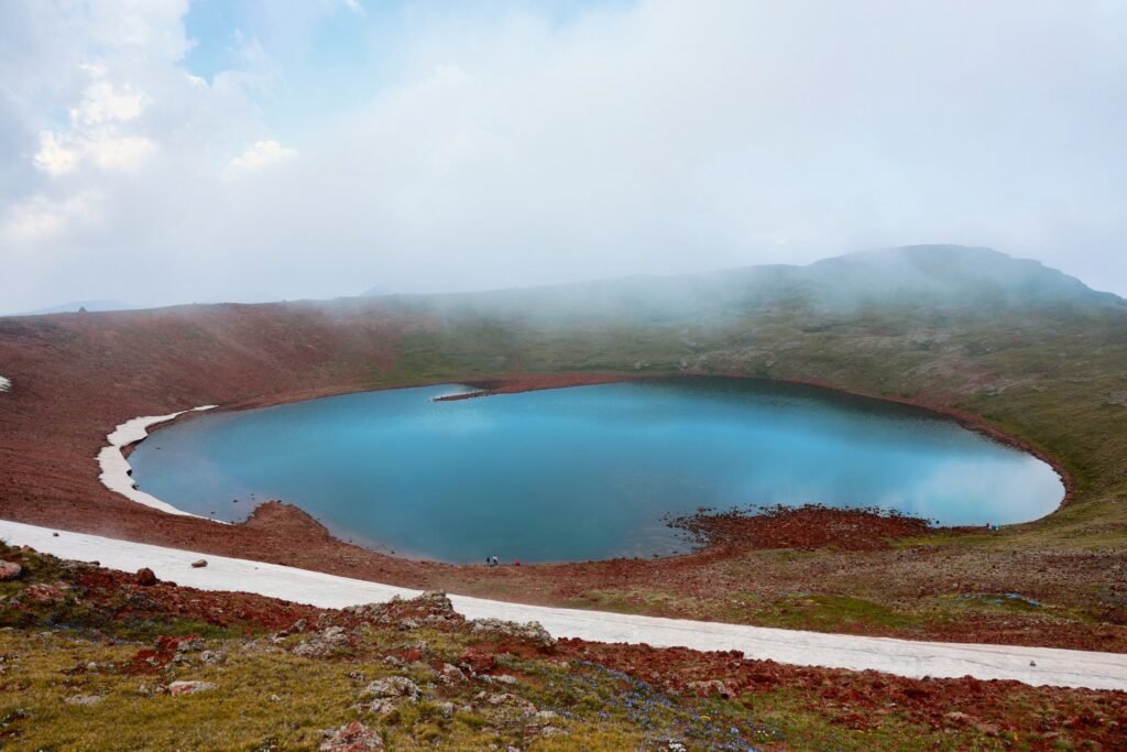 Serene blue lake surrounded by mountains